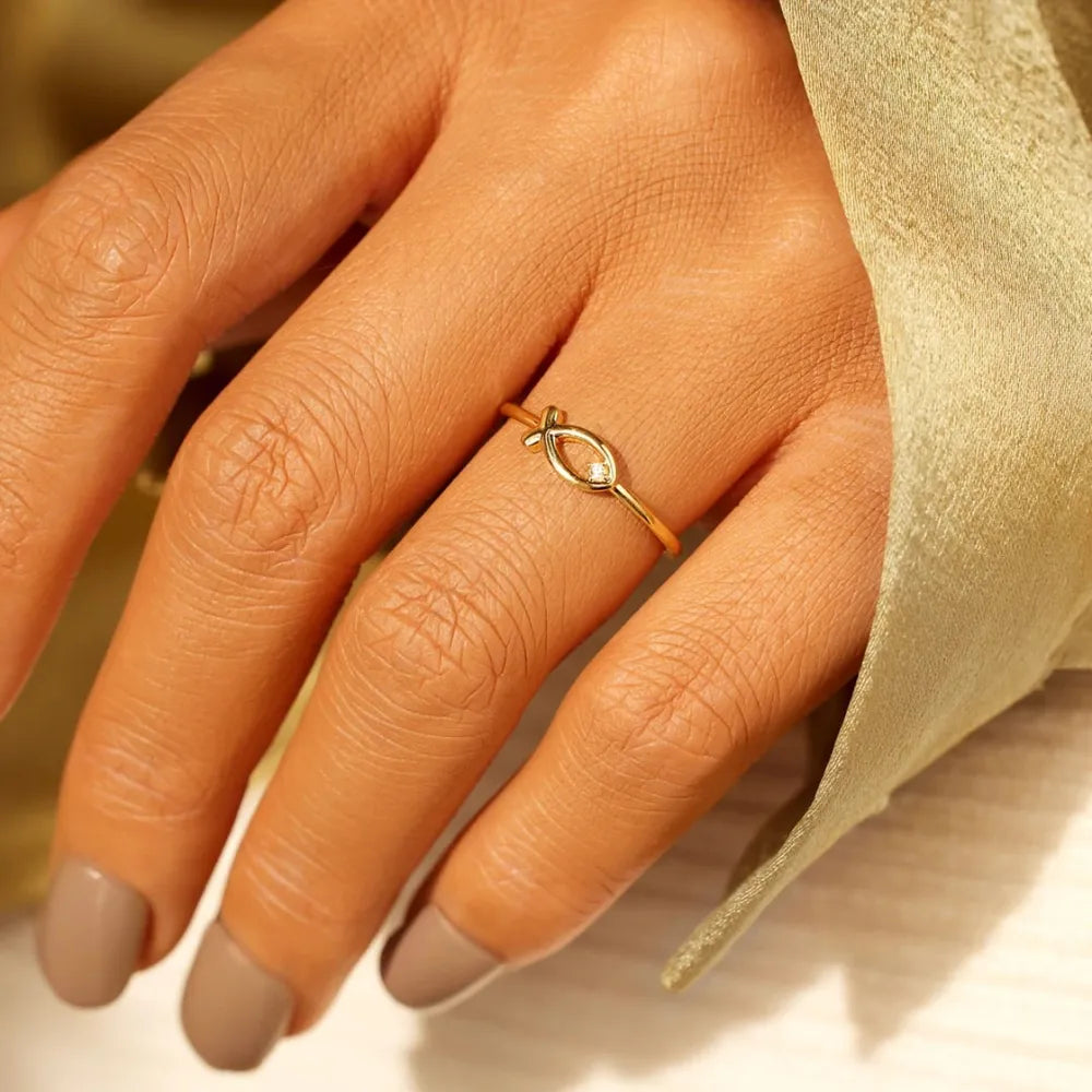 Delicate Gold Fish-Shaped Ring with Tiny Gem - A Whimsical and Elegant Finger Adornment