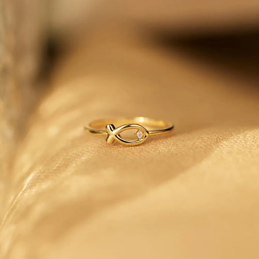 Delicate Gold Fish-Shaped Ring with Tiny Gem - A Whimsical and Elegant Finger Adornment
